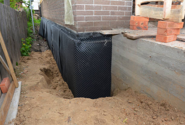 Happy homeowners after waterproofing job in Langhorne